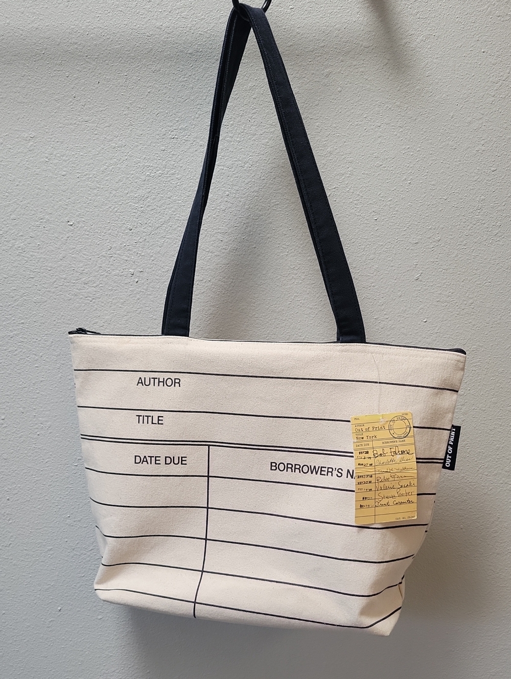 Out of Print Cream Canvas Tote with Black Straps and Library Card Print